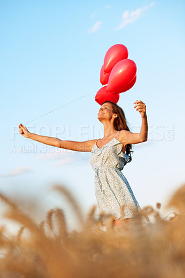 Buy stock photo Fun, freedom or woman outdoor with balloons, trip celebration or carefree on summer break. Happy, low angle or person in countryside with space, special moment or holiday enjoyment in nature.
