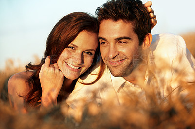 Buy stock photo Countryside, happy and couple in field for love, bonding and connection on summer weekend together. Dating, portrait and man with woman in nature for relationship, trust and relax on holiday outdoor