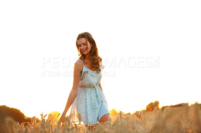Buy stock photo Travel, wheat and relax with woman in field for explore, adventure getaway and sunset in countryside. Happy, wellness and peace with person in nature for mockup space, vacation and summer holiday