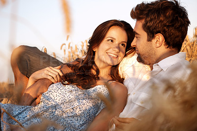 Buy stock photo Travel, couple and relax with love in wheat field for romantic getaway, holiday connection or trust. Support, happy people and talk in countryside for anniversary trip, bonding together and peaceful