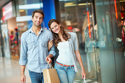 Buy stock photo Happy, shopping and portrait with couple in mall for retail promotion, boutique sales and love. Support, store deal and consumer product with man and woman with bags for customer, smile and discount