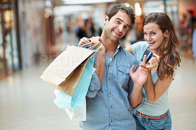 Buy stock photo Portrait, mall or happy couple with shopping bag or credit card for payment, purchase or banking. Woman, man or smile with debit or gifts for financial relationship, love or care in commercial center