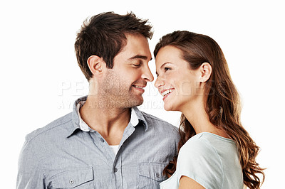 Buy stock photo Love, smile and support with couple in studio for connection, trust and bonding together. Marriage commitment, romance and loyalty with man and woman on white background for care and partner