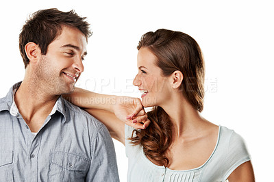 Buy stock photo Love, smile and laughing with couple in studio for connection, trust and bonding together. Marriage commitment, romance and loyalty with man and woman on white background for joke and partner