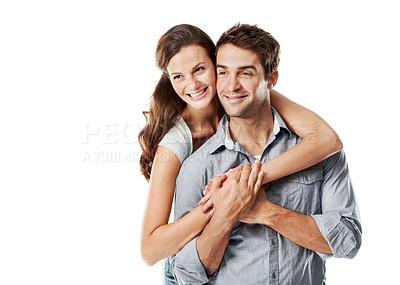 Buy stock photo Smile, hug and couple in studio with bonding, connection or commitment in marriage together. Happy, space and woman embracing man for safety, love and care in relationship on white background.