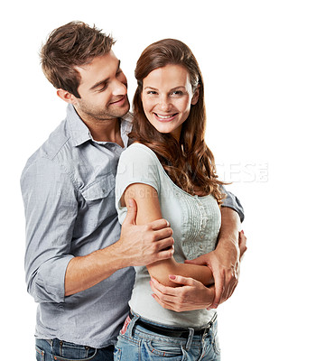 Buy stock photo Smile, hug and couple in studio with bonding, connection or commitment in marriage with trust. Happy, portrait and woman embracing man for safety, love and care in relationship on white background.