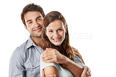 Buy stock photo Couple, portrait and smile in studio, hug and bonding with partner, confident or connection on break. White background, space and happy people with commitment for relationship, romance and together
