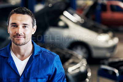 Buy stock photo Service, pride or car mechanic in workshop with portrait, ambition or about us as repair technician. Smile, man or auto engineer with uniform, confidence or career growth in vehicle maintenance.