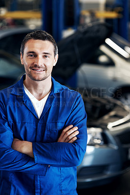 Buy stock photo Happy man, portrait or mechanic in workshop with arms crossed, repair service or about us in garage. Repairman, confident or car in small business for quality assurance, vehicle care or diagnostics