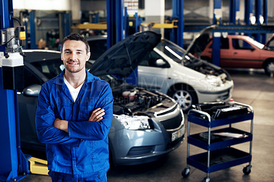 Buy stock photo Happy man, portrait or mechanic in garage with arms crossed, repair service or about us for maintenance. Repairman, smile or tools in small business for quality assurance, vehicle care or diagnostics