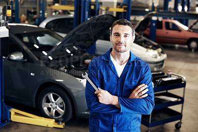 Buy stock photo Man, tools and mechanic in portrait with confidence, repair service and about us for maintenance. Repairman, arms crossed and spanner in garage for quality assurance, vehicle care and diagnostics