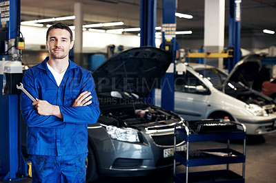 Buy stock photo Service, arms crossed or man in repair shop with portrait, tools or about us as car technician. Pride, mechanic or auto engineer with wrench, confidence or career growth in vehicle maintenance.