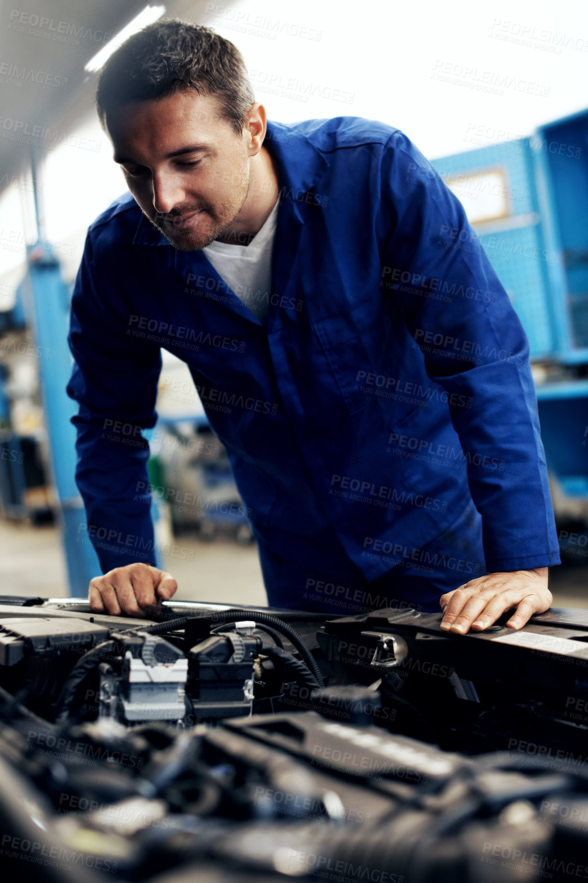 Buy stock photo Auto repair, man and engine inspection in workshop for sensor diagnostics, fluid level or safety. Mechanic, person and car service in garage for vehicle maintenance, operational check and calibration