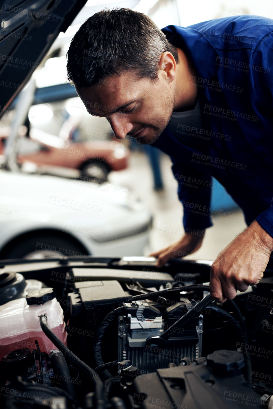 Buy stock photo Tools, workshop and man with car repair for engine inspection, diagnostics and maintenance. Garage, mechanic and person with equipment for fixing, calibration and auto service for vehicle performance
