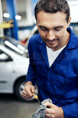 Buy stock photo Car, mechanic and test oil in workshop with dipstick, maintenance service or skills for small business. Tools, man and technician check engine in garage with vehicle evaluation, repair or inspection.