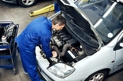 Buy stock photo Workshop, inspection and above of man with car for engine repair, diagnostics or maintenance. Garage, tools and mechanic with equipment for fixing, calibration or auto service for vehicle performance