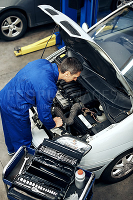 Buy stock photo Workshop, above and man with car for engine repair, diagnostics or maintenance for auto service. Mechanic, tool and person with equipment for fixing, calibration or inspection for vehicle performance