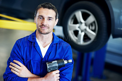 Buy stock photo Car, portrait and tool with man in garage for automobile maintenance or repair. Impact wrench, service and transportation with mechanic in vehicle workshop for professional check or inspection