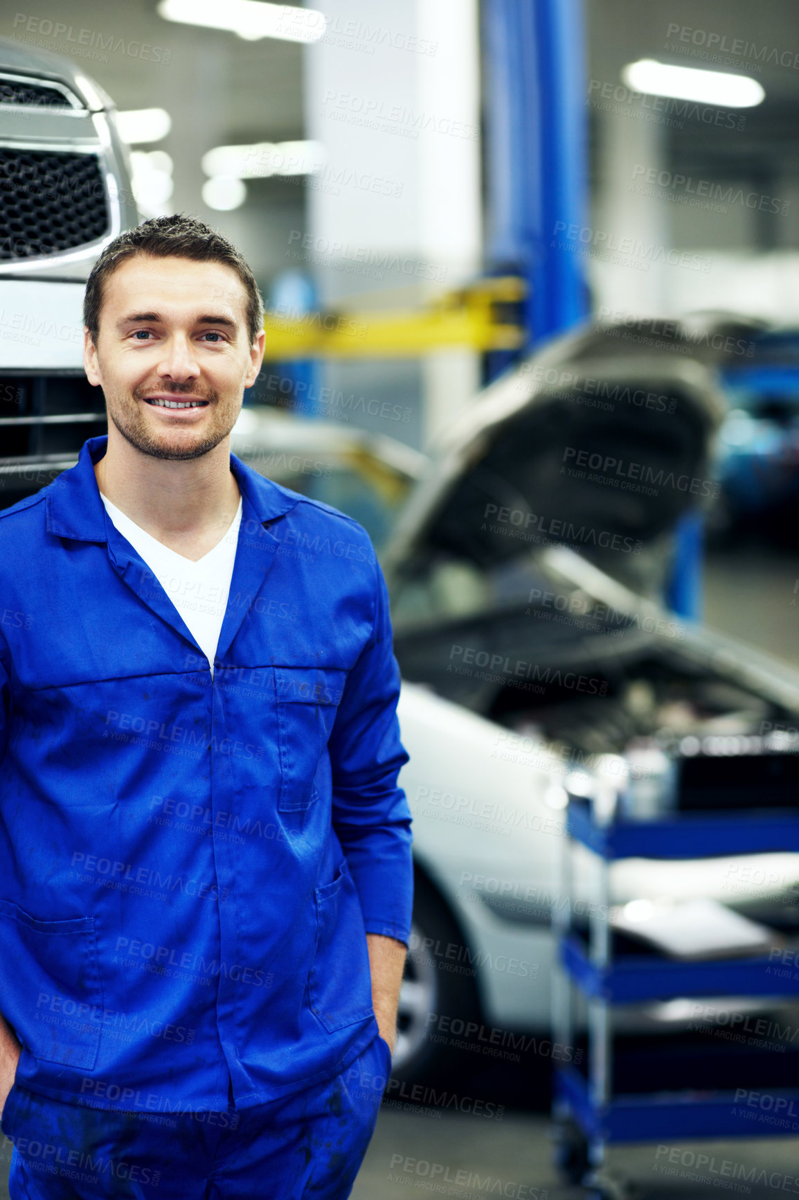 Buy stock photo Car, portrait and space with man in garage for automobile maintenance or repair. Industry, mechanic and service with confident engineer in vehicle workshop for professional check or inspection