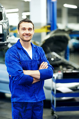 Buy stock photo Service, arms crossed or car mechanic in workshop with portrait, ambition or about us as repair technician. Smile, man or auto engineer with uniform, confidence or career pride in vehicle maintenance