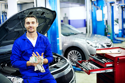 Buy stock photo Auto repair, mechanic or cleaning hands in garage for car service, routine maintenance or oil change. Cloth, man or inspection portrait in workshop for fluid check, motor grease or diagnostic testing