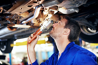 Buy stock photo Car, light and maintenance with man in garage for vehicle inspection, repair or service. Lamp, review and undercarriage with mechanic in automobile workshop for check, compliance or engineering job