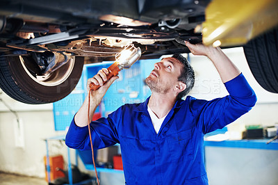 Buy stock photo Car, lamp and maintenance with man in workshop for vehicle inspection, repair or service. Light, motor and undercarriage with mechanic in automobile garage for check, compliance or engineering job