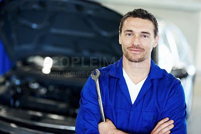 Buy stock photo Portrait, tool or car mechanic in workshop with arms crossed, ambition or pride as repair technician. Service, smile or automatic engineer with wrench, confidence or about us in vehicle maintenance.