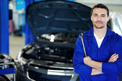 Buy stock photo Man, tools or mechanic in portrait with arms crossed, repair service or about us in workshop. Repairman, confident or spanner in garage for quality assurance, car care or maintenance in workplace