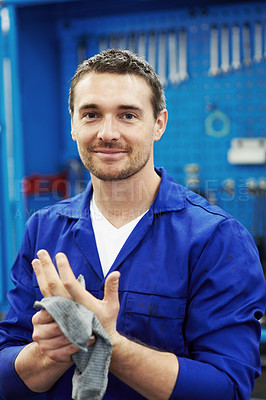 Buy stock photo Car service, mechanic or cleaning hands in workshop for auto repair, routine maintenance or smile. Cloth, man and happy portrait in garage for vehicle inspection, occupational health and safety
