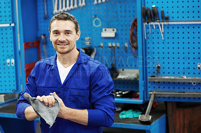 Buy stock photo Man, mechanic or portrait at tools with cleaning, grease removal or cloth with smile in garage. Repairman, wipe or happy in workshop for repair service, maintenance or finished task in small business