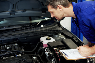Buy stock photo Mechanic, man and car service with clipboard in workshop for diagnostics, engine check or compliance. Technician, mature person and motor checklist for vehicle inspection, notes and auto repair quote