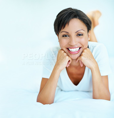 Buy stock photo Happy, woman and relax in bedroom with portrait, peace and comfortable for calm morning. Space, female person or chilling on bed with good mood, positive attitude and weekend break for unwind in home