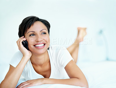 Buy stock photo Phone call, smile and thinking with woman on bed in home for conversation, ideas or planning. Comfortable, communication and space with happy person in apartment bedroom for break, me time or relax