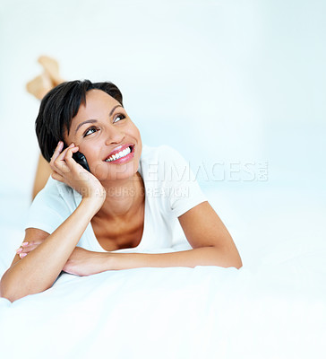 Buy stock photo Happy, phone call and thinking with woman on bed in home for conversation, ideas or planning. Communication, smile and space with thoughtful person in apartment bedroom for break, me time or relax