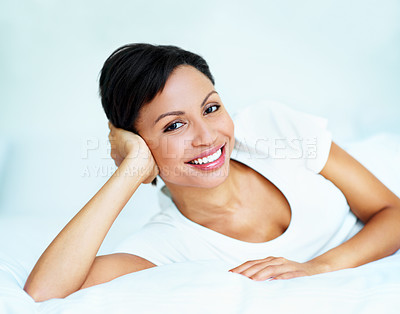 Buy stock photo Wellness, portrait and happy woman on bed with day off, positive attitude or optimism on weekend break. Wellbeing, smile or person in home with good mood, comfortable and satisfaction in Los Angeles.