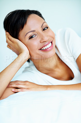 Buy stock photo Portrait, smile and woman in bedroom with peaceful weekend break, positive attitude and good mood. Space, female person relax and unwind in house with comfortable bed, wellness and lazy morning.