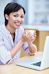 Taking her coffee break to do some browsing