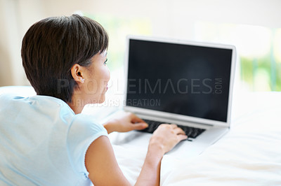 Buy stock photo Creative, research and woman with laptop screen on bed, freelancer and planning for blog post on web. Copywriting, remote work and happy person with tech, email marketing and typing article in house