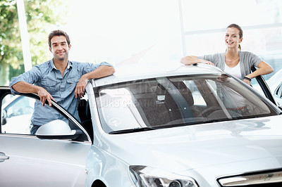 Buy stock photo Couple, portrait and smile with new car for dealership purchase, appointment and celebration. Loan approval, showroom and people shopping for motor rental, retail and investment for transportation