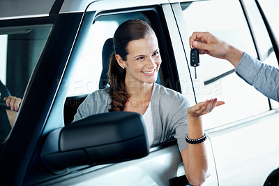 Buy stock photo Woman, keys and excited in new car with salesman, ownership and investment milestone at dealership. Customer, dealer and happy at vehicle window for purchase, handover and loan agreement in showroom