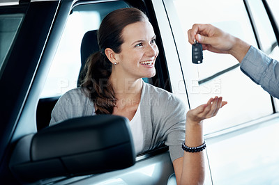 Buy stock photo Woman, keys and happy in new car with salesman, ownership and investment milestone at dealership. Customer, dealer and excited at vehicle window for purchase, handover and loan agreement in showroom