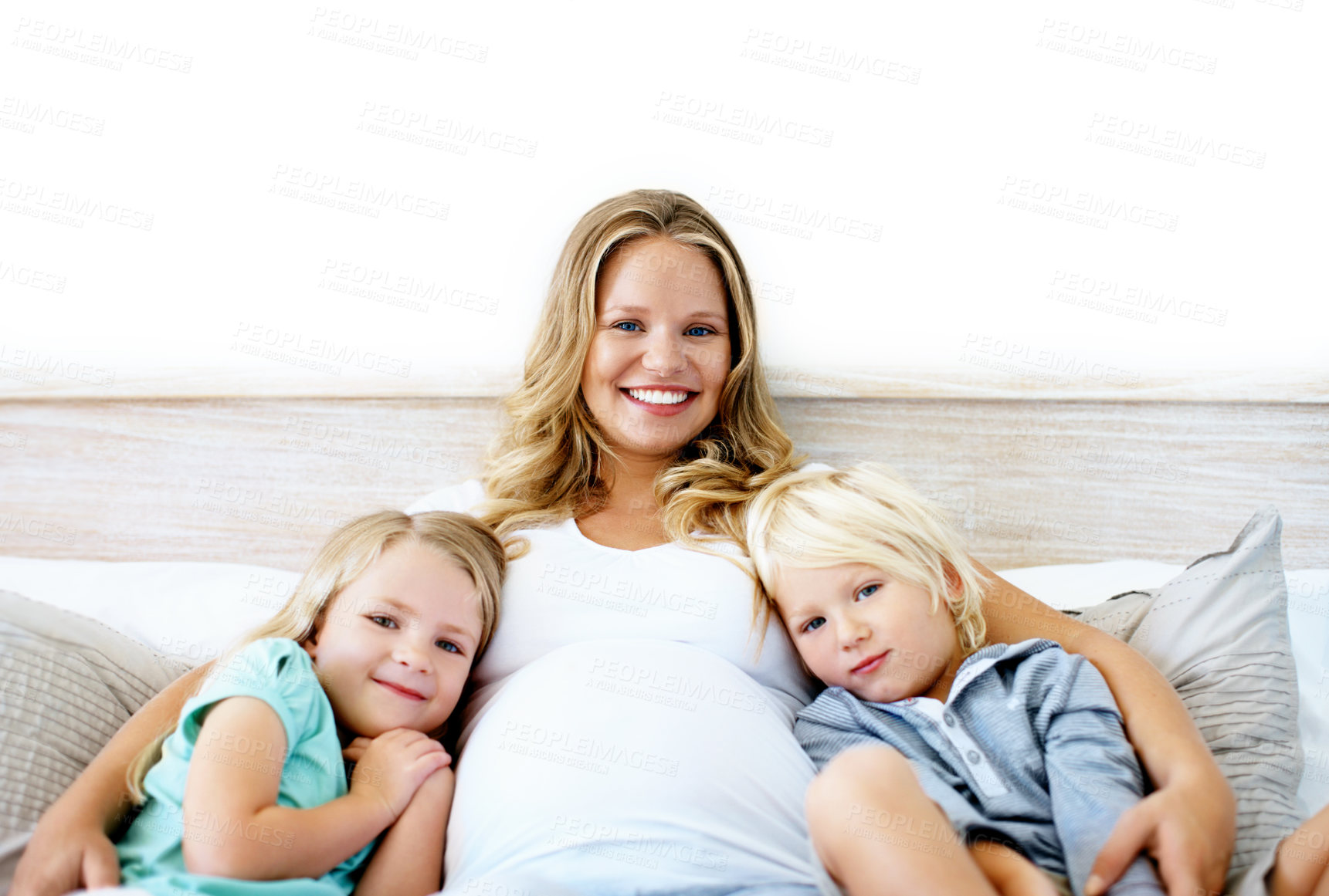 Buy stock photo Pregnancy, portrait and smile with mother and kids in home for bonding, support and connection. Prenatal growth, development and security with pregnant woman and siblings in living rom for family