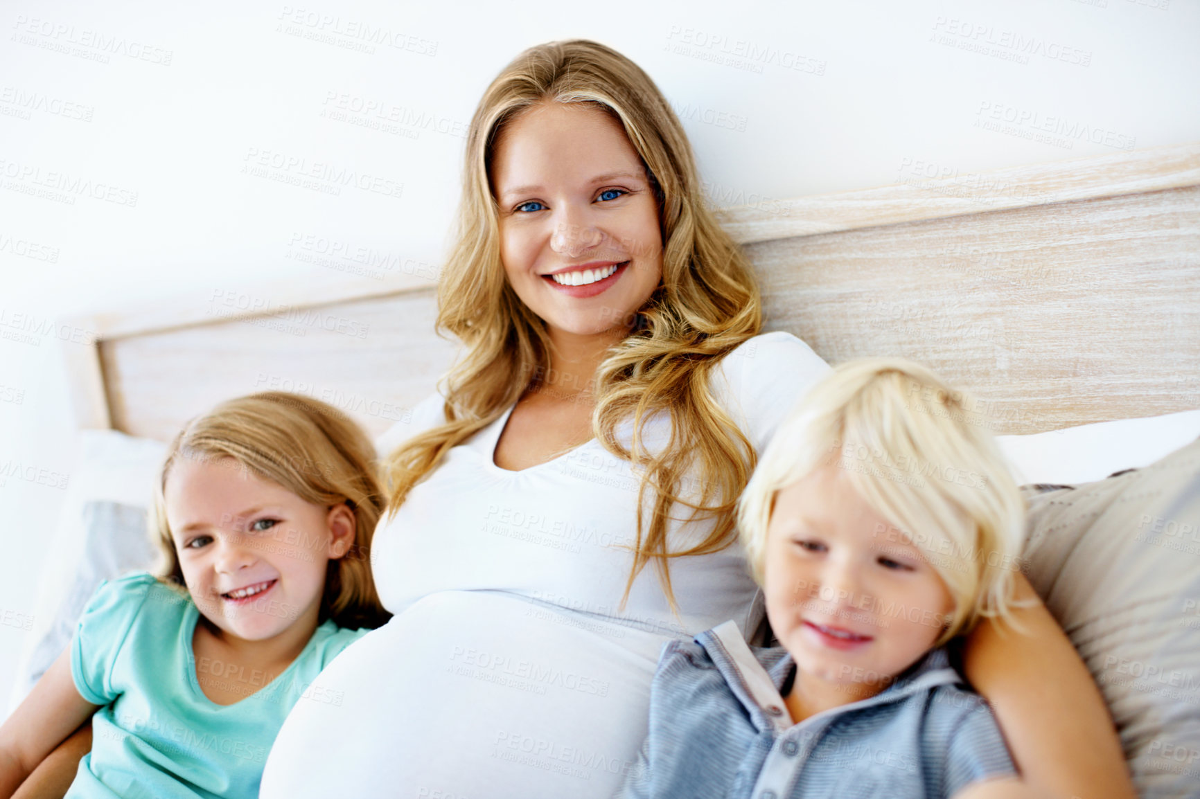 Buy stock photo Smile, portrait and relax with pregnant woman and kids in home for bonding, support and connection. Prenatal growth, pregnancy development and security with mother and siblings in house for family