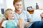 Sharing some time together with their e-reader