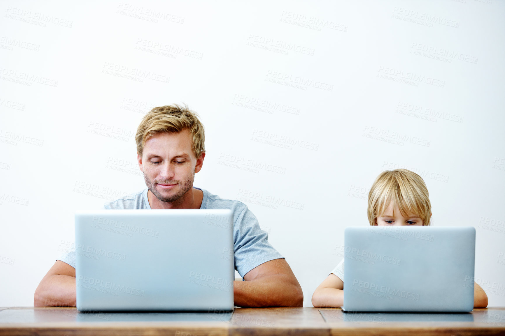 Buy stock photo Laptop, freelancer and research with father and child in home for support, typing and teaching portal. Remote work, online project and elearning website with man and kid in family house for help