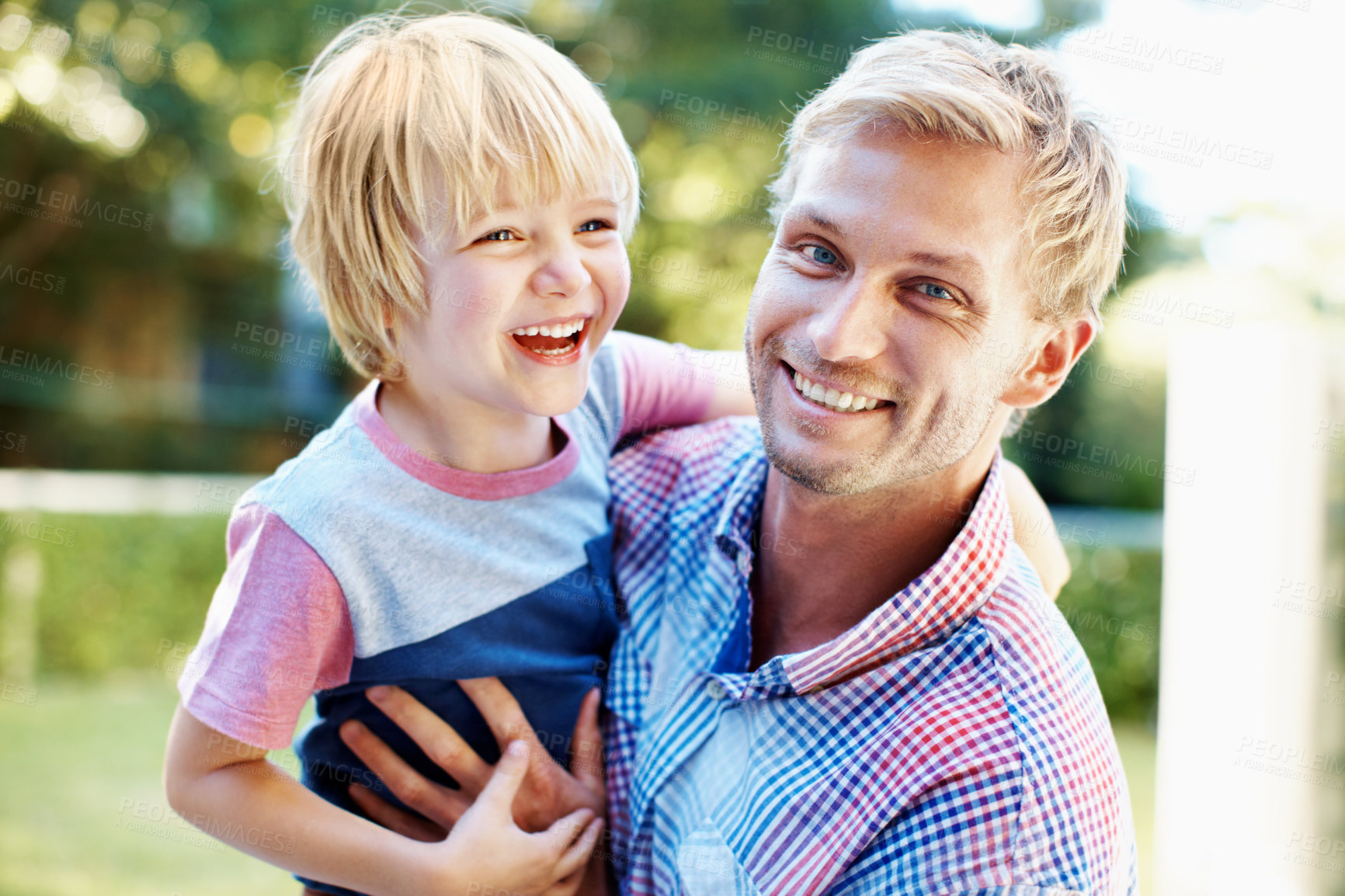 Buy stock photo Smile, care and funny with father and son outdoor for bonding, support or connection. Security, happiness and laugh with portrait of man and child in backyard of home for love and family vacation