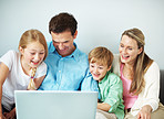 Family time in front of the laptop