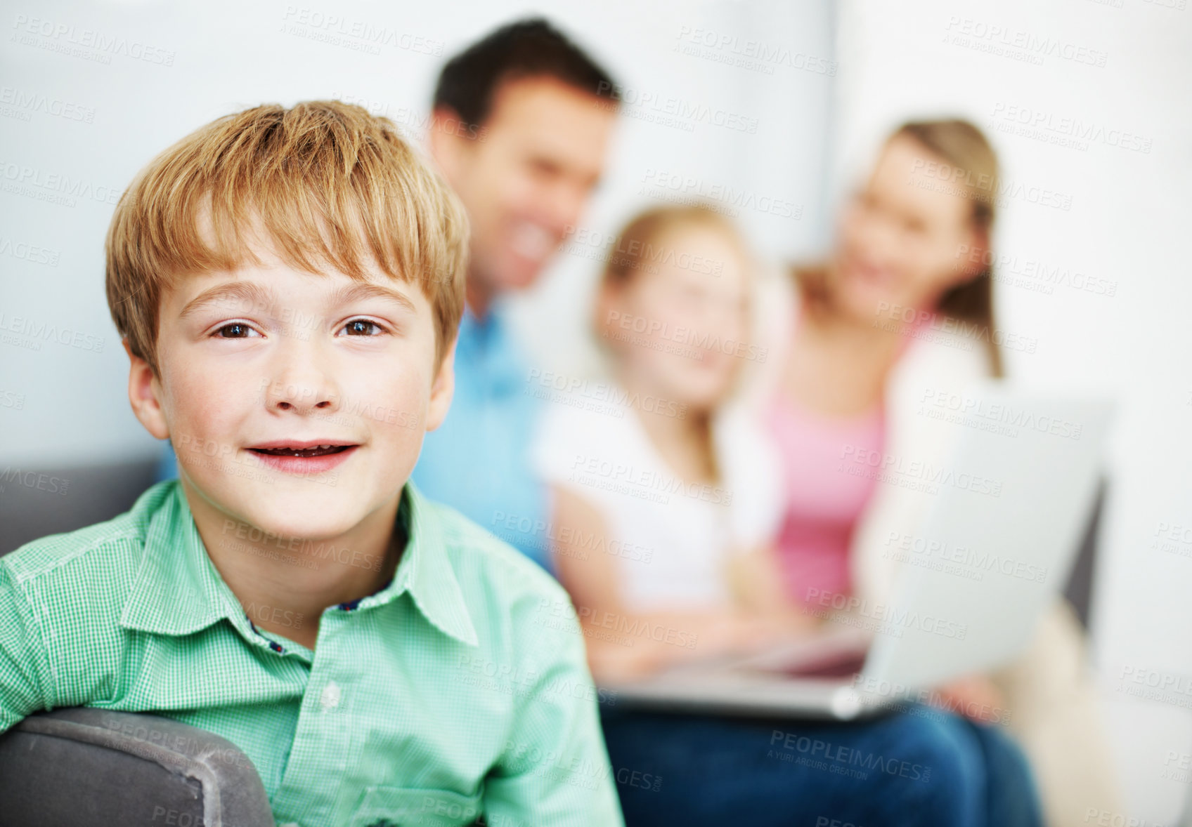 Buy stock photo Portrait, child and relax in home with smile, positive attitude and calm morning for peace. Happy, boy and unwind in living room with family, comfortable and chilling on sofa for growth development