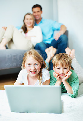 Buy stock photo Relax, portrait or kids on floor with laptop, cartoon series or bonding with movie streaming. Happy, parents or children in home with tech, multimedia subscription or family show on digital platform.